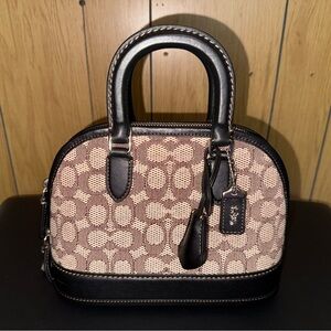 Coach Revel Bag 24 in signature jacquard